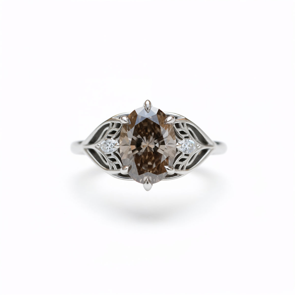 #21 18k White Gold Elvindell Three Stone